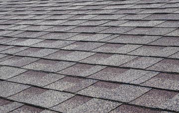 Springkell tiles for shallow pitch roofing